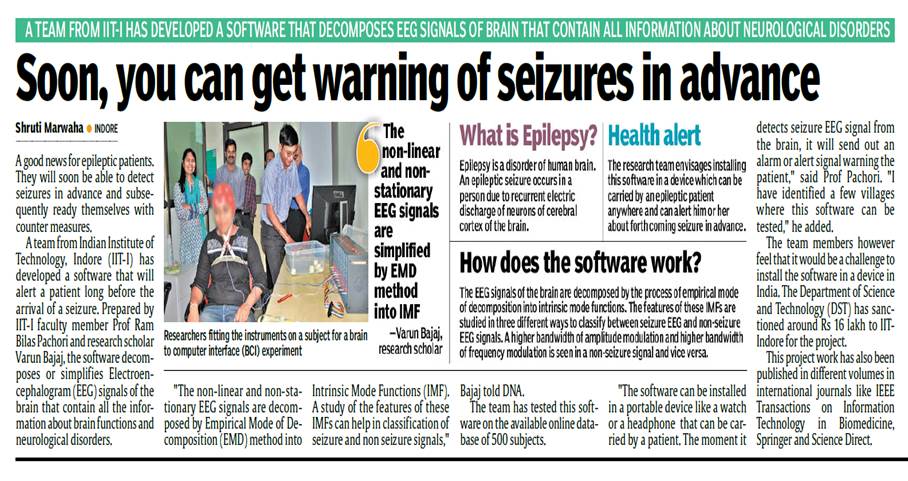 A person standing in front of a computer

Description automatically generated